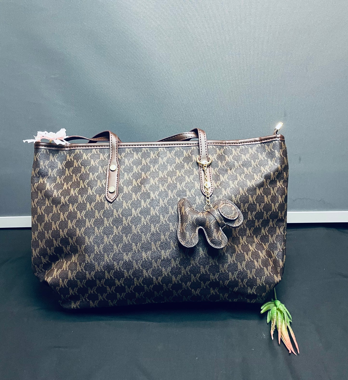 Brown purse with puppy keychain