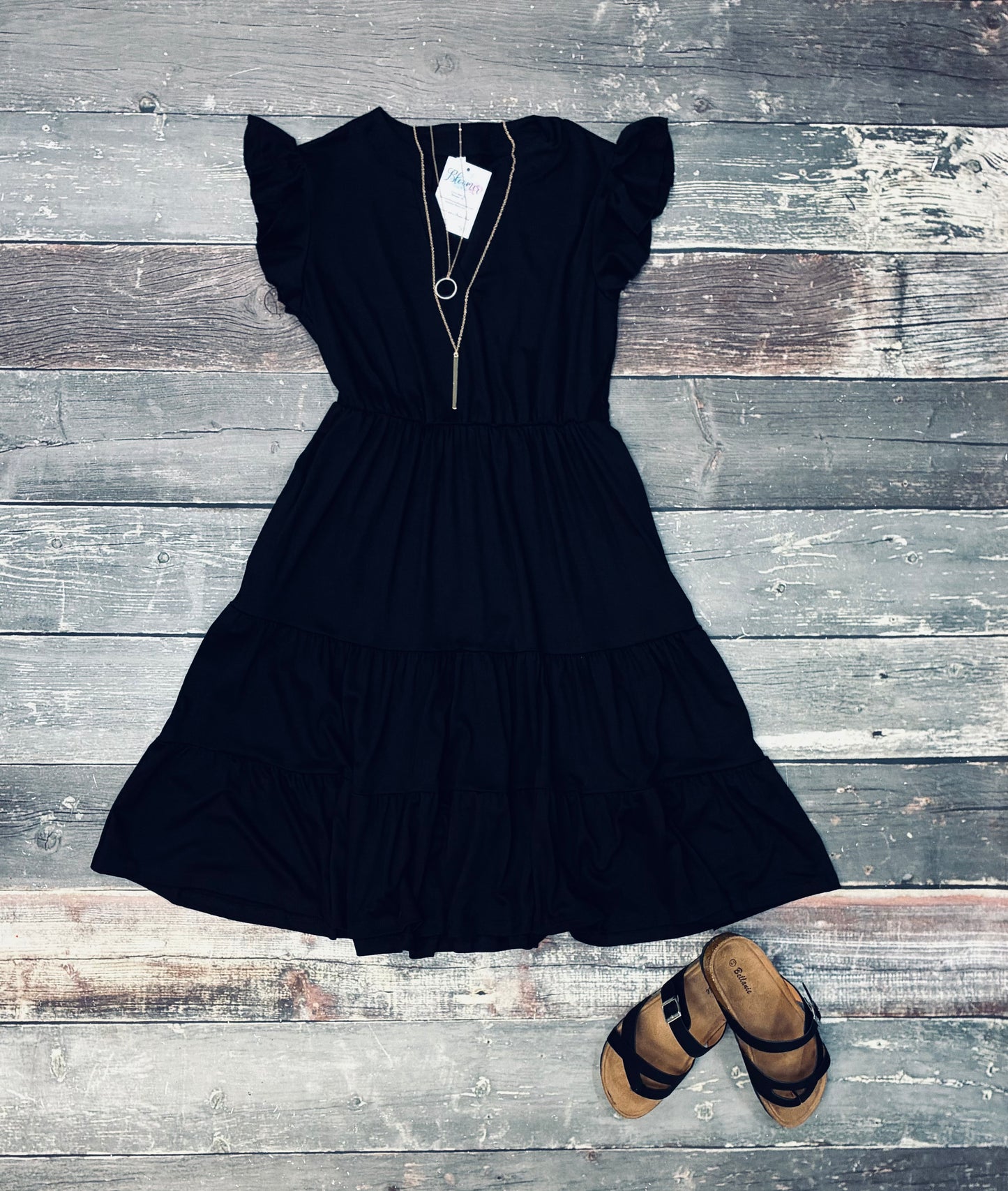 Black ruffle dress