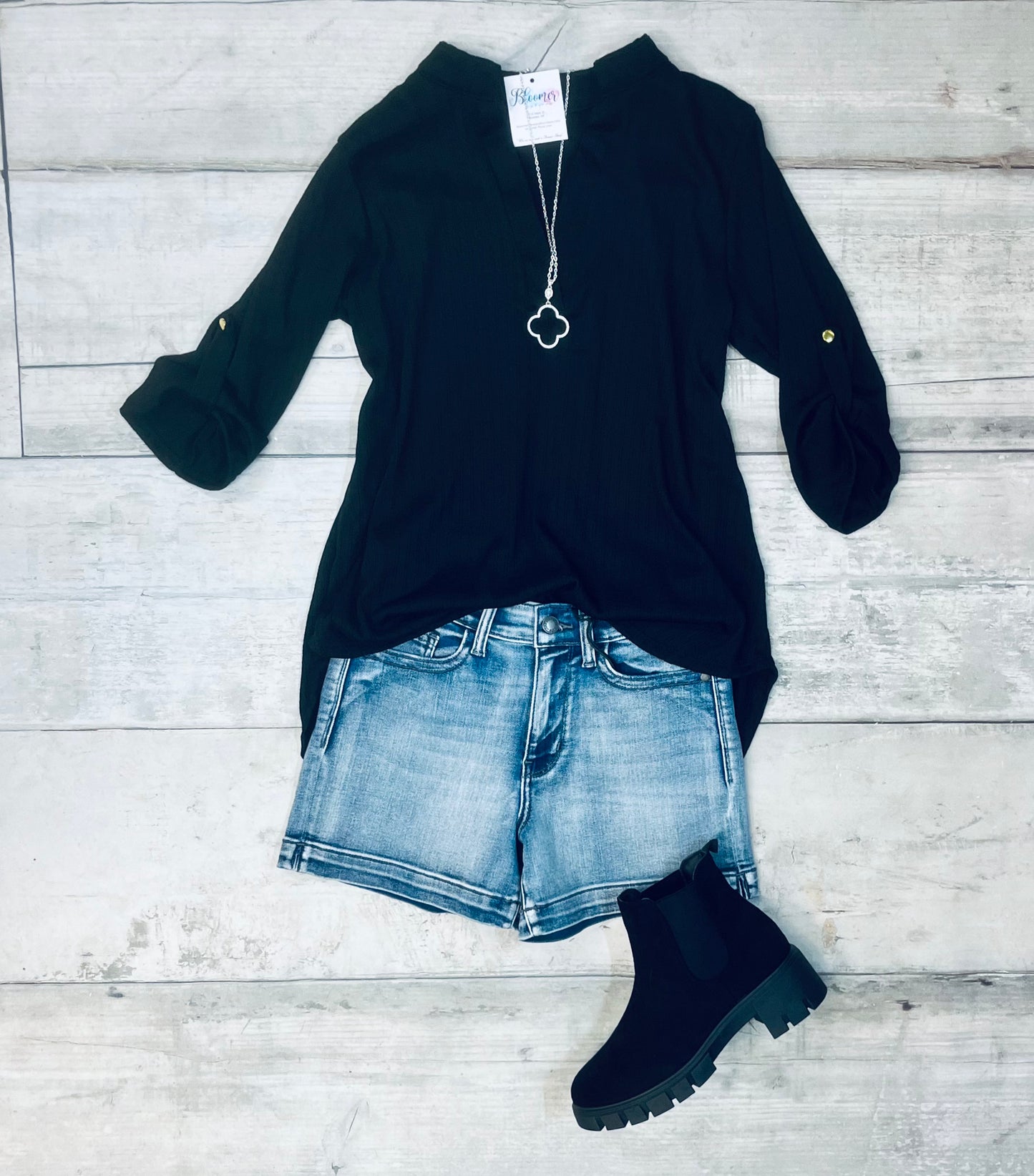 Knit black top with rolled sleeves
