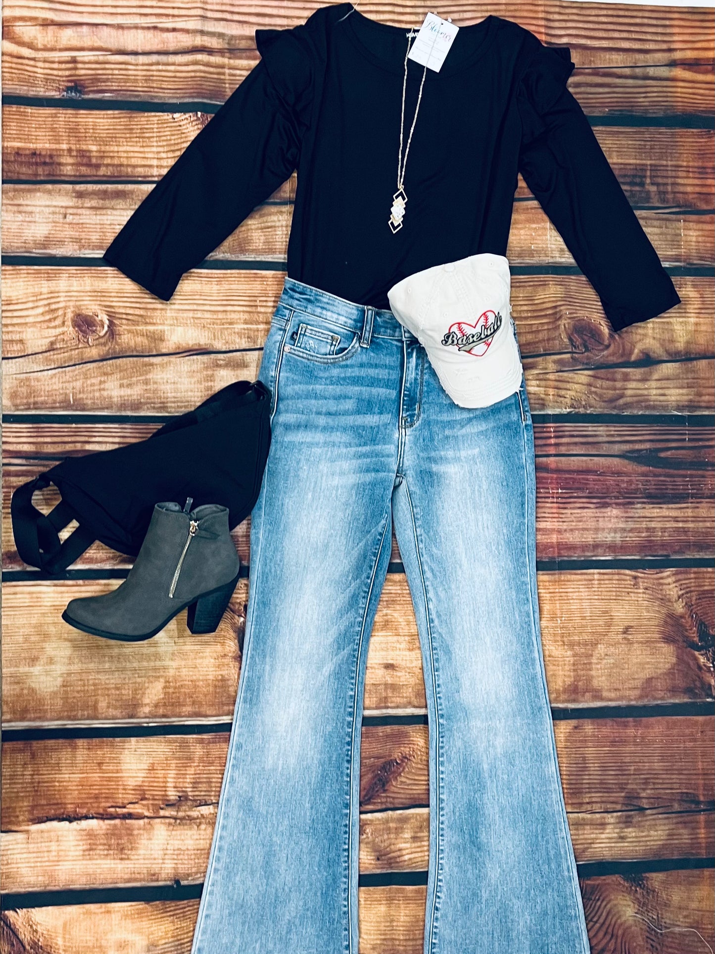 Black shoulder ruffle top