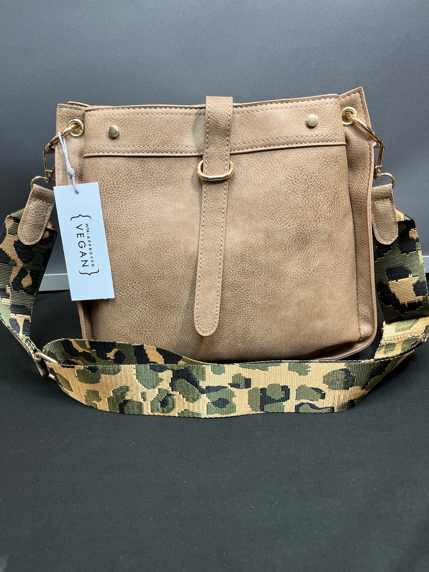 Tan purse with camo strap