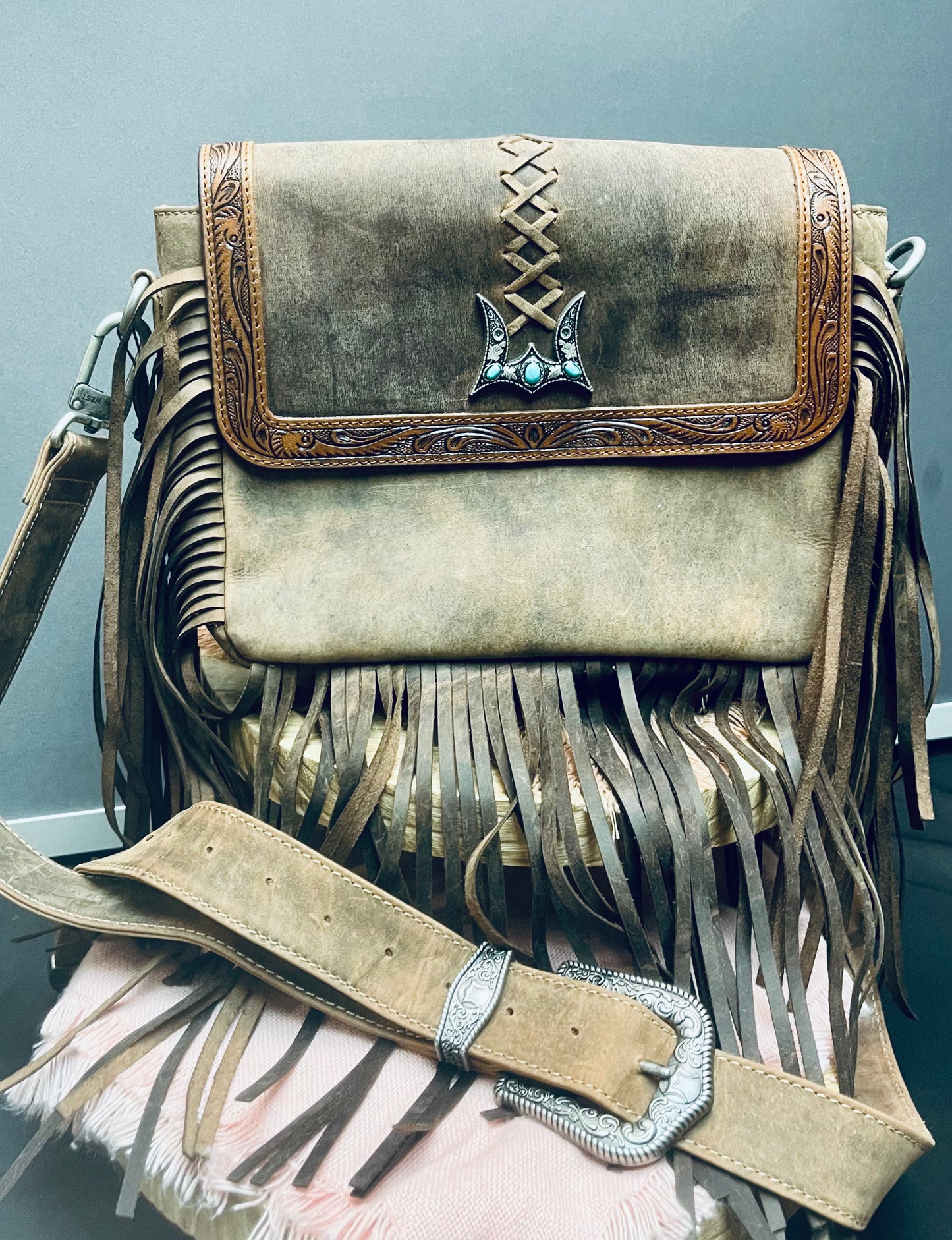 Hide purse w/ fringe and buckle strap