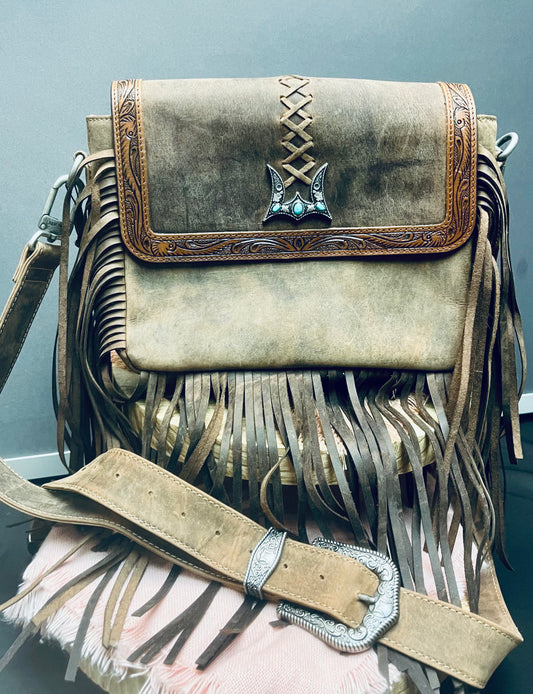 Hide purse w/ fringe and buckle strap