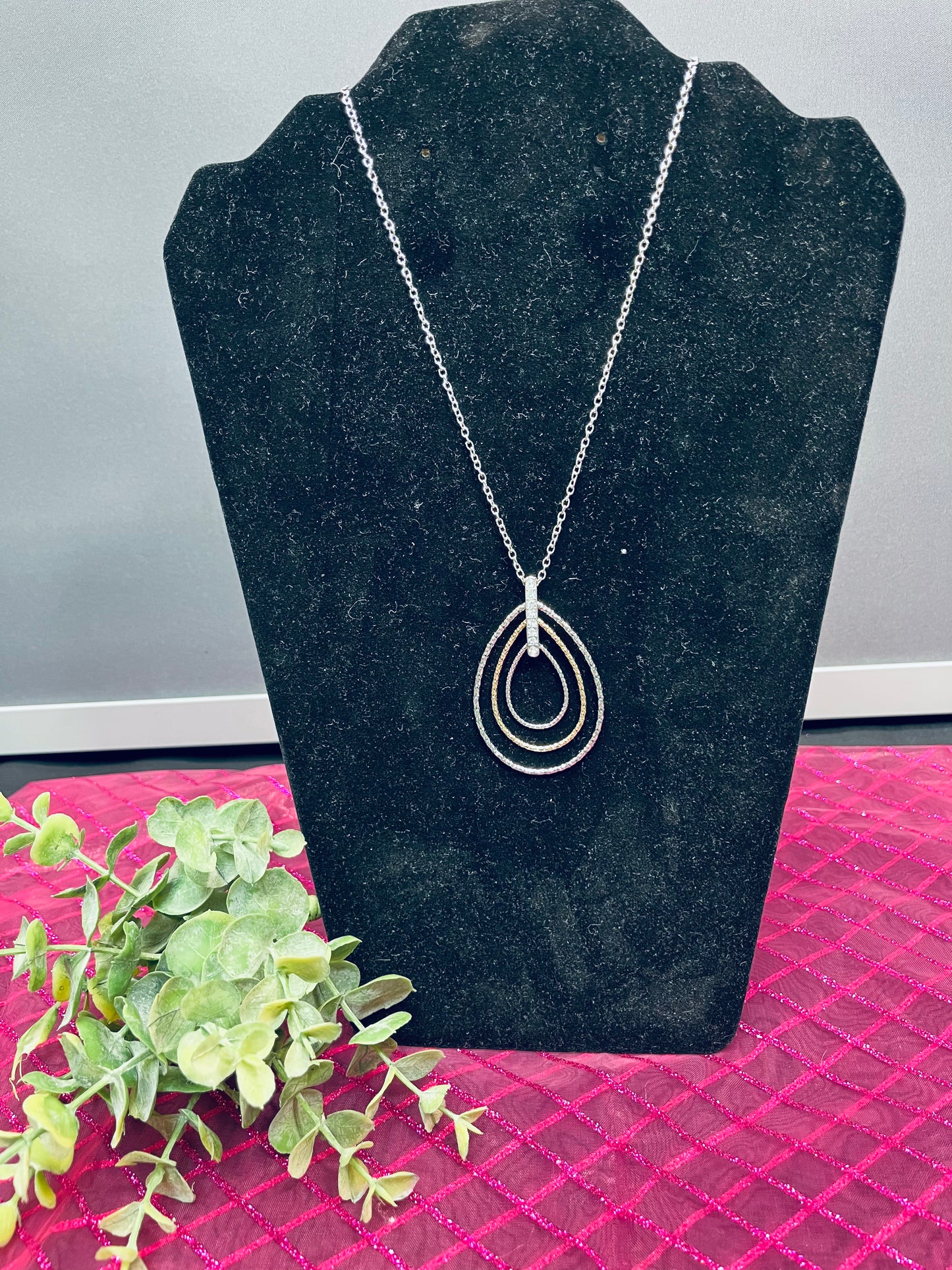 Silver/gold ringed teardrop necklace