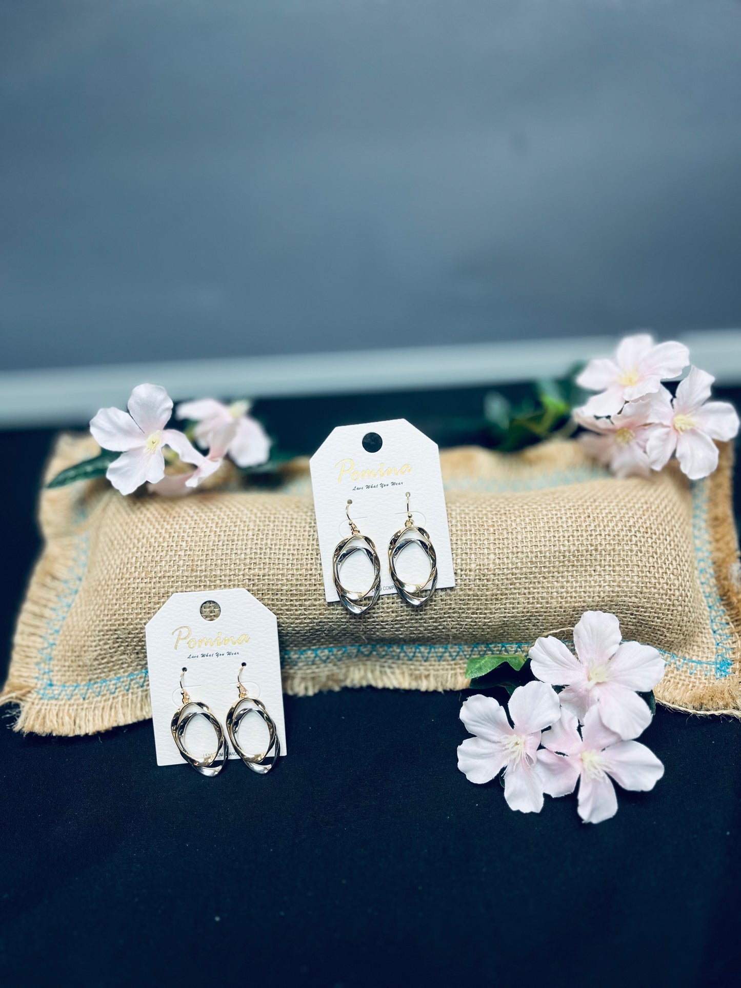 Silver and gold twisted oval earrings