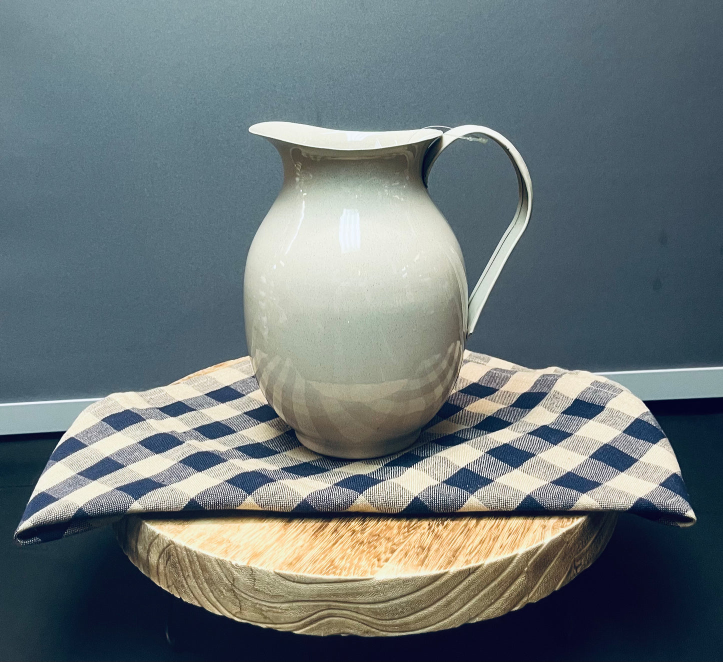 Tan speckled pitcher