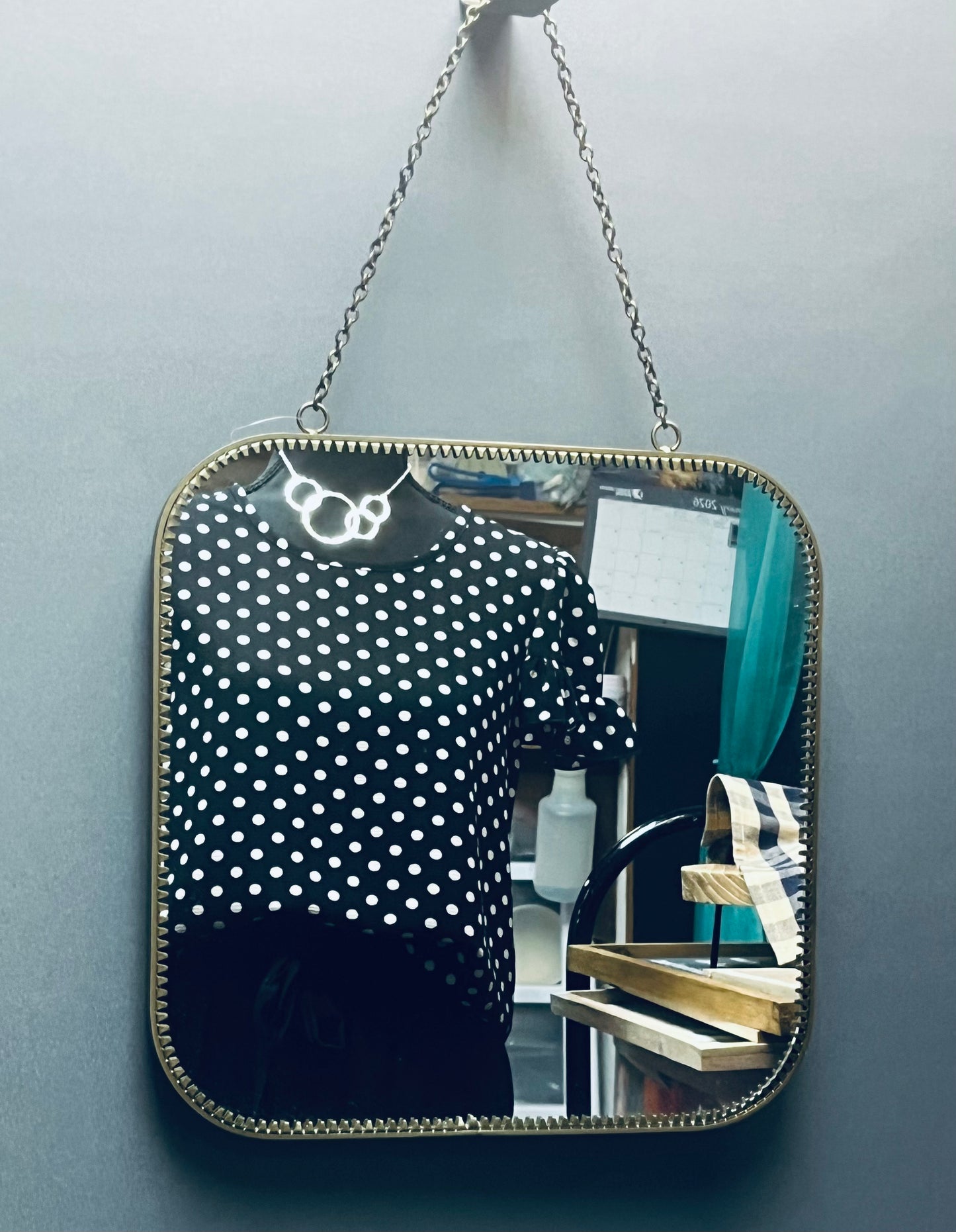 Gold mirror with chain