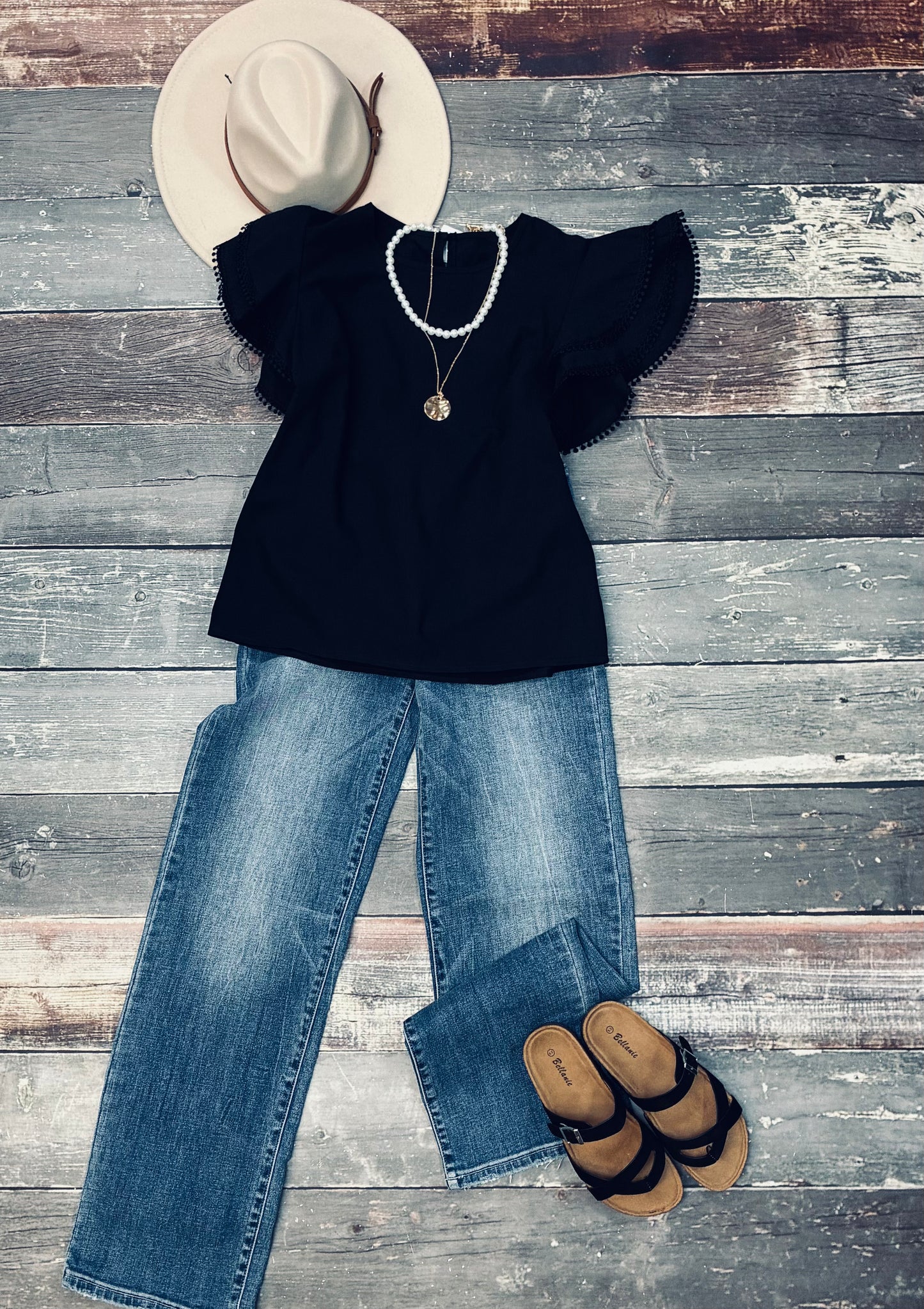 Black ruffle top