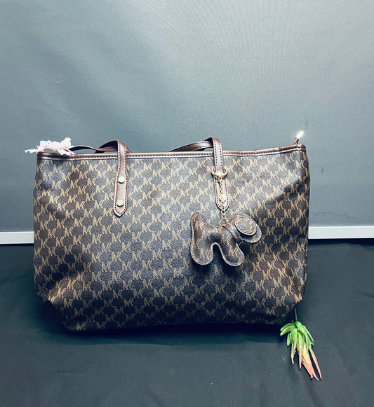 Brown purse with puppy keychain