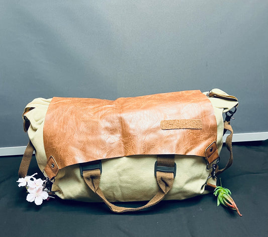 Tan duffle bag