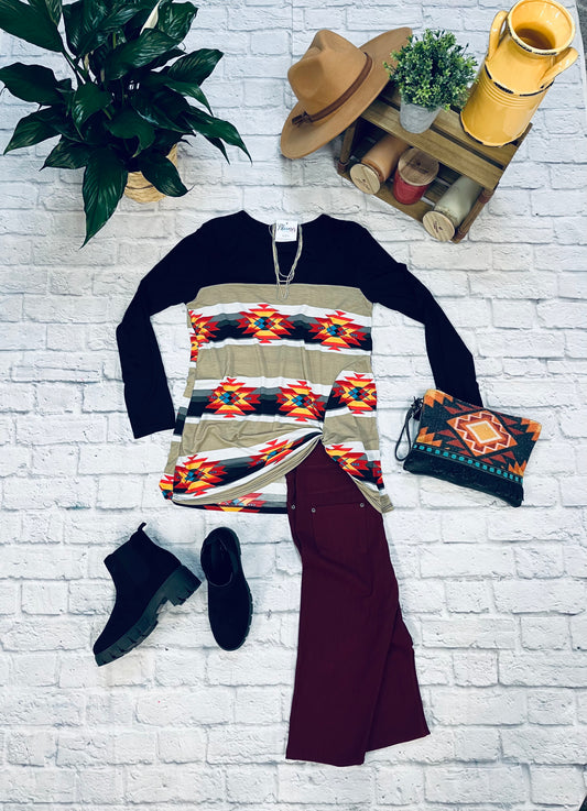 Black long sleeve top with Aztec design, gathered at hip