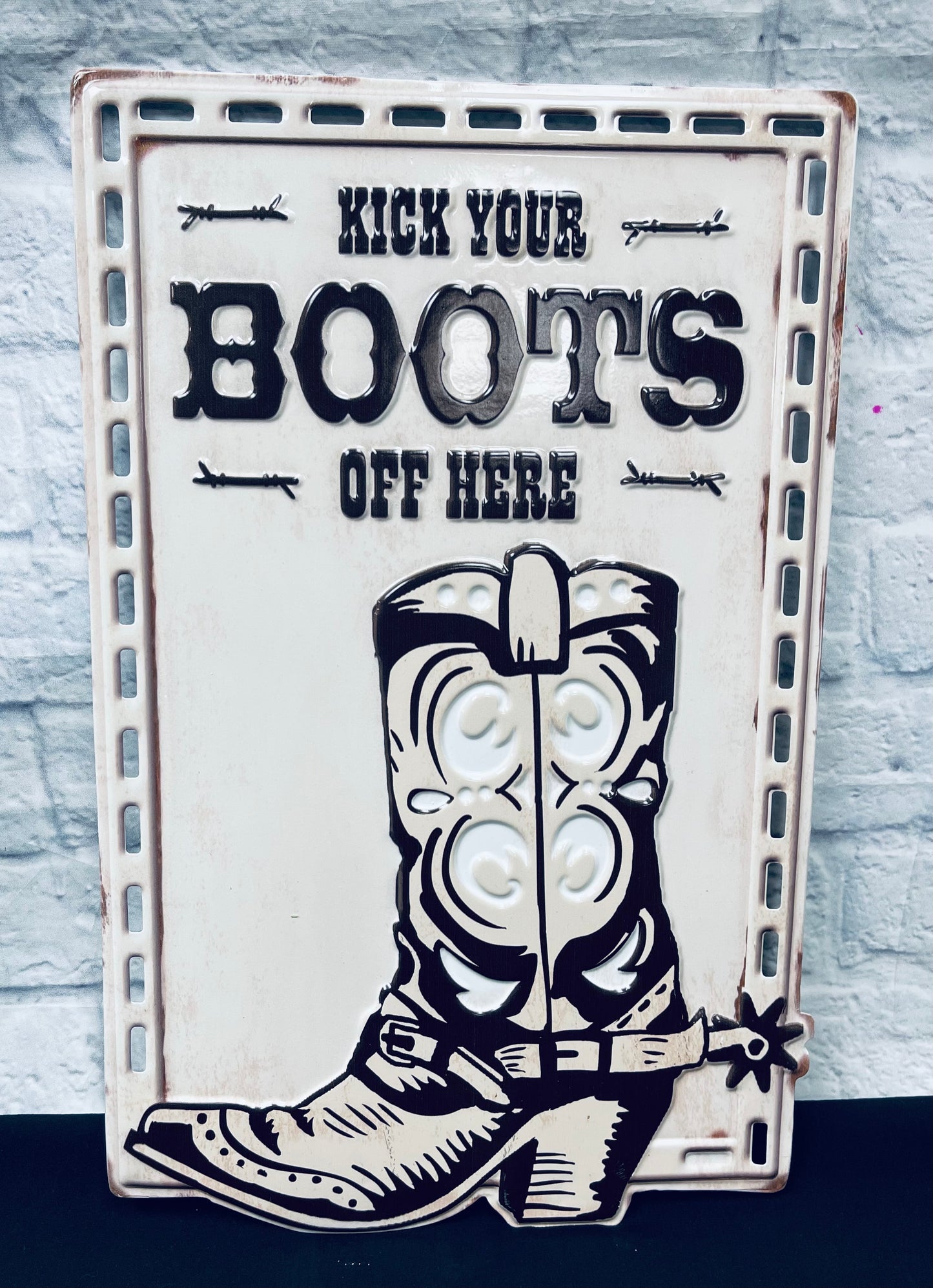 “Kick Your Boots Off Here”